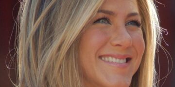 Introduction Jennifer Aniston is one of the most admired actresses in Hollywood history. She became a global sensation through her unforgettable role as Rachel Green in the famous television sitcom Friends. Over the years, she has built a successful career in movies, television, business, and fashion. Her charming personality and timeless beauty continue to attract millions of fans around the world. The popularity of Jennifer Aniston has remained strong for decades because she connects naturally with audiences of every generation. From comedy movies to emotional drama series, she has shown incredible versatility as an actress. Her influence extends beyond entertainment because she is also known for her hairstyles, wellness routines, and inspiring lifestyle choices that continue to shape modern celebrity culture. Jennifer Aniston Early Life and Background Jennifer Aniston was born on February 11, 1969, in Sherman Oaks, Los Angeles, California. She grew up in a family connected to the entertainment industry, which introduced her to acting at an early age. Her father, John Aniston, was a respected television actor, while her mother Nancy Dow also worked in the entertainment field. This creative environment inspired her passion for performance. During her childhood, Jennifer Aniston developed an interest in theater and storytelling. She attended the Fiorello H. LaGuardia High School of Music & Art and Performing Arts in New York City. Her education helped her improve her acting abilities and gave her confidence to pursue a professional career in Hollywood. Even before fame arrived, she remained determined and hardworking. Jennifer Aniston Journey Into Acting Before becoming famous, Jennifer Aniston faced several struggles while trying to establish herself in the entertainment industry. She worked in off-Broadway productions and appeared in small television roles that did not receive much attention. Like many young actors, she experienced rejection and uncertainty during the beginning of her career journey. Despite these difficulties, Jennifer Aniston never gave up on her dream. She continued attending auditions and improving her acting skills until she finally received opportunities in television comedy. Her dedication and natural screen presence eventually helped her stand out among many talented performers competing in Hollywood during the early 1990s. Jennifer Aniston Rise to Fame With Friends The biggest turning point in Jennifer Aniston’s career came when she was cast as Rachel Green in Friends. The sitcom premiered in 1994 and quickly became one of the most successful television shows in entertainment history. Her role as the fashionable and lovable Rachel transformed her into a household name almost overnight. Friends remained popular for ten seasons and created a loyal fan base across the globe. Jennifer Aniston gained praise for her comedic timing, emotional performances, and relatable personality on screen. The chemistry among the cast members made the series unforgettable, and Rachel Green became one of television’s most iconic female characters. Jennifer Aniston and the Cultural Impact of Friends The success of Friends changed television culture forever and helped Jennifer Aniston achieve worldwide recognition. Fans admired her fashion choices, hairstyles, and romantic storylines throughout the series. The famous “Rachel haircut” became one of the most requested hairstyles during the 1990s and influenced beauty trends internationally. Jennifer Aniston also received several prestigious awards because of her role in Friends. She won an Emmy Award and a Golden Globe Award for her outstanding performance. Even years after the show ended, Friends continues attracting new audiences through streaming platforms, proving the lasting impact of Jennifer Aniston on popular entertainment. Jennifer Aniston Movies and Hollywood Success After establishing herself on television, Jennifer Aniston successfully moved into the film industry. She appeared in many romantic comedies and comedy films that became box office hits. Her ability to balance humor, emotion, and charm helped her gain popularity among movie audiences worldwide. Some of her most successful movies include Just Go with It, Marley & Me, Horrible Bosses, We’re the Millers, and Along Came Polly. These films showcased her versatility as an actress and confirmed her status as one of Hollywood’s most bankable stars. Her performances consistently attracted viewers looking for entertaining and relatable storytelling. Jennifer Aniston Dramatic Roles and Career Growth Although many people recognize Jennifer Aniston for comedy roles, she has also delivered impressive dramatic performances throughout her career. She proved her acting depth in movies such as Cake and The Good Girl, where she portrayed emotionally complex characters with sensitivity and realism. Her ability to explore different genres allowed Jennifer Aniston to evolve beyond sitcom fame. Critics praised her willingness to take challenging roles that revealed new dimensions of her talent. This growth helped her maintain a respected position in Hollywood while continuing to attract audiences interested in meaningful storytelling. Jennifer Aniston Television Comeback Years after Friends ended, Jennifer Aniston returned to television with The Morning Show. The series explores the competitive world of broadcast journalism and highlights modern social issues within the media industry. Her performance received widespread praise from critics and viewers alike. The Morning Show demonstrated that Jennifer Aniston could still dominate television with mature and powerful performances. She portrayed a successful yet emotionally conflicted news anchor, showing a deeper and more dramatic side of her acting abilities. The series introduced her talent to a younger generation of streaming audiences. Jennifer Aniston Personal Life and Relationships The personal life of Jennifer Aniston has always attracted media attention. Her relationships, marriages, and friendships frequently appear in entertainment news headlines. Despite intense public interest, she has often handled media pressure with grace and professionalism. Jennifer Aniston married actor Brad Pitt in 2000, and the couple quickly became one of Hollywood’s most famous celebrity pairs. Their relationship received global attention because both stars were extremely popular at the time. Although they eventually divorced in 2005, fans continued discussing their relationship for many years afterward. Jennifer Aniston Marriage to Justin Theroux Several years after her divorce from Brad Pitt, Jennifer Aniston found love again with actor and screenwriter Justin Theroux. The couple married in 2015 after dating for several years. Their relationship appeared private and supportive compared to many highly publicized Hollywood romances. Although Jennifer Aniston and Justin Theroux separated in 2018, they remained respectful toward each other publicly. Their mature handling of the separation earned admiration from fans and media outlets. Jennifer Aniston has consistently emphasized the importance of friendship, honesty, and personal growth in relationships. Jennifer Aniston and Media Attention Throughout her career, Jennifer Aniston has experienced constant attention from tabloids and celebrity news organizations. Rumors about her relationships, family plans, and personal choices frequently become trending topics online. Despite this pressure, she often responds calmly and avoids unnecessary public conflict. Jennifer Aniston has spoken openly about the unrealistic expectations placed on women in Hollywood. She encourages people to focus on personal happiness rather than social pressure. Her honesty about fame, aging, and self-acceptance has inspired many fans who admire her confidence and emotional strength. Jennifer Aniston Net Worth and Business Ventures Jennifer Aniston is considered one of the highest-paid actresses in Hollywood. Her successful acting career, endorsement deals, and business partnerships have helped her build impressive financial success over several decades. She continues earning significant income from television projects and streaming agreements. In addition to acting, Jennifer Aniston launched her own haircare brand called LolaVie. The brand focuses on beauty and wellness products inspired by healthy haircare routines. Her influence in fashion and beauty helped the business attract immediate attention from fans and consumers around the world. Jennifer Aniston Luxury Lifestyle The luxurious lifestyle of Jennifer Aniston often fascinates fans and entertainment magazines. She owns beautiful properties in California and enjoys elegant interior design inspired by modern comfort and artistic creativity. Her homes frequently appear in celebrity lifestyle publications because of their stylish appearance. Despite her wealth, Jennifer Aniston is also known for maintaining a balanced and peaceful lifestyle. She enjoys spending time with close friends, caring for pets, practicing yoga, and relaxing at home. Her calm and grounded personality makes her relatable despite her superstar status in Hollywood. Jennifer Aniston Fitness and Wellness Routine One reason Jennifer Aniston continues looking youthful and energetic is her dedication to health and wellness. She follows regular workout routines that include yoga, strength training, and cardio exercises. Her disciplined fitness habits help her maintain both physical and mental balance. Jennifer Aniston also focuses on healthy eating and mindful living. She prefers nutritious meals, hydration, and self-care practices that support long-term wellness. Many fans admire her healthy lifestyle because it promotes balance rather than unrealistic beauty standards often associated with celebrity culture. Jennifer Aniston Beauty and Fashion Influence The beauty influence of Jennifer Aniston extends far beyond Hollywood movies and television shows. Her hairstyles, skincare routines, and fashion choices have inspired trends for many years. She is frequently recognized as one of the most stylish and naturally beautiful celebrities in the entertainment industry. Fashion magazines often praise Jennifer Aniston for her elegant yet simple clothing style. She prefers timeless fashion instead of short-lived trends, which helps her maintain a sophisticated public image. Her beauty philosophy focuses on confidence, wellness, and authenticity rather than excessive glamour. Jennifer Aniston Social Media Popularity Jennifer Aniston joined social media later than many celebrities, but her online presence quickly became extremely popular. Millions of followers enjoy her behind-the-scenes photos, personal updates, and humorous interactions with friends and co-stars. Her Instagram account gained attention almost immediately after launch. Fans appreciate the natural and friendly personality Jennifer Aniston displays on social media. She shares moments related to work, friendships, wellness, and charity activities while maintaining privacy in important areas of her personal life. This balanced approach strengthens her connection with audiences worldwide. Jennifer Aniston Friendships in Hollywood Strong friendships have played an important role in the life of Jennifer Aniston. She remains especially close to her former Friends co-stars, including Courteney Cox and Lisa Kudrow. Their lasting friendship continues to delight fans who loved watching them together on television. Jennifer Aniston is also known for maintaining positive relationships with many celebrities across Hollywood. Colleagues frequently describe her as kind, supportive, and easy to work with during film and television productions. Her friendly personality contributes greatly to her respected reputation within the entertainment industry. Jennifer Aniston Philanthropy and Charity Work Beyond acting and entertainment, Jennifer Aniston actively supports charitable causes and humanitarian projects. She has donated to organizations focused on children’s health, disaster relief, cancer research, and social justice issues. Her involvement demonstrates a strong commitment to helping communities in need. Jennifer Aniston also uses her celebrity influence to raise awareness about important global concerns. She participates in fundraising campaigns and encourages fans to support meaningful causes. Her charitable efforts reflect compassion and responsibility beyond the glamorous image associated with Hollywood fame. Jennifer Aniston Influence on Pop Culture Very few actresses have influenced modern pop culture as deeply as Jennifer Aniston. From television comedy to fashion and beauty trends, her impact remains visible decades after her rise to fame. Her role as Rachel Green became a symbol of confidence, independence, and modern womanhood. Jennifer Aniston continues inspiring younger generations of actors, influencers, and fans. Her ability to remain relevant in changing entertainment industries shows remarkable adaptability and professionalism. She successfully balances nostalgia from Friends with fresh projects that attract contemporary audiences worldwide. Jennifer Aniston and Modern Hollywood The entertainment industry has changed dramatically since Jennifer Aniston first became famous. Streaming services, social media, and digital platforms transformed the way celebrities interact with audiences. Despite these changes, she remains one of the most recognizable and respected names in Hollywood. Jennifer Aniston has adapted successfully by choosing projects that appeal to both longtime fans and younger viewers. Her continued success proves that talent, authenticity, and professionalism can create a lasting career in entertainment. She remains a powerful example of longevity within a highly competitive industry. Jennifer Aniston Future Projects and Career Outlook Fans continue eagerly anticipating future projects from Jennifer Aniston because of her consistent ability to entertain audiences. Whether through television dramas, comedy films, or business ventures, she continues exploring new opportunities while maintaining the charm that made her famous. Industry experts believe Jennifer Aniston will remain influential for many more years because of her strong fan base and proven talent. Her career demonstrates resilience, creativity, and adaptability in an ever-changing entertainment landscape. She continues shaping Hollywood through both performance and personal influence. Conclusion Jennifer Aniston remains one of the most successful and admired actresses in modern entertainment history. Her journey from aspiring actress to global superstar reflects dedication, resilience, and exceptional talent. Through television, movies, beauty ventures, and philanthropy, she continues influencing millions of people around the world. The lasting popularity of Jennifer Aniston proves that authenticity and hard work can create a timeless legacy. Fans admire her not only for her acting abilities but also for her honesty, elegance, and inspiring lifestyle. As her career continues evolving, she remains an unforgettable icon in Hollywood and global pop culture. FAQs Who is Jennifer Aniston? Jennifer Aniston is an American actress, producer, and businesswoman best known for playing Rachel Green in the television sitcom Friends. She is also famous for her successful movie career and beauty influence. How old is Jennifer Aniston? Jennifer Aniston was born on February 11, 1969. She is widely admired for maintaining a healthy lifestyle and youthful appearance throughout her long career. What are Jennifer Aniston’s most popular movies? Some of the most popular Jennifer Aniston movies include Just Go with It, Marley & Me, We’re the Millers, Horrible Bosses, and Along Came Polly. Was Jennifer Aniston married to Brad Pitt? Yes, Jennifer Aniston married Brad Pitt in 2000. The couple divorced in 2005 but remained one of Hollywood’s most talked-about celebrity relationships. Does Jennifer Aniston have children? Jennifer Aniston does not have children. She has publicly discussed the pressure women often face regarding marriage and motherhood expectations. What is Jennifer Aniston’s net worth? Jennifer Aniston has earned significant wealth through acting, endorsements, production work, and business ventures. She is considered one of Hollywood’s highest-paid actresses. What TV show made Jennifer Aniston famous? The television sitcom Friends made Jennifer Aniston internationally famous. Her role as Rachel Green became one of the most iconic characters in television history. What business does Jennifer Aniston own? Jennifer Aniston owns LolaVie, a beauty and haircare brand focused on wellness-inspired hair products and healthy beauty routines. Why is Jennifer Aniston so popular? Jennifer Aniston remains popular because of her acting talent, relatable personality, timeless beauty, and long-lasting influence on television, fashion, and entertainment culture. Is Jennifer Aniston active on Instagram? Yes, Jennifer Aniston is active on Instagram and shares updates about her work, friendships, lifestyle, and charitable activities with millions of followers.